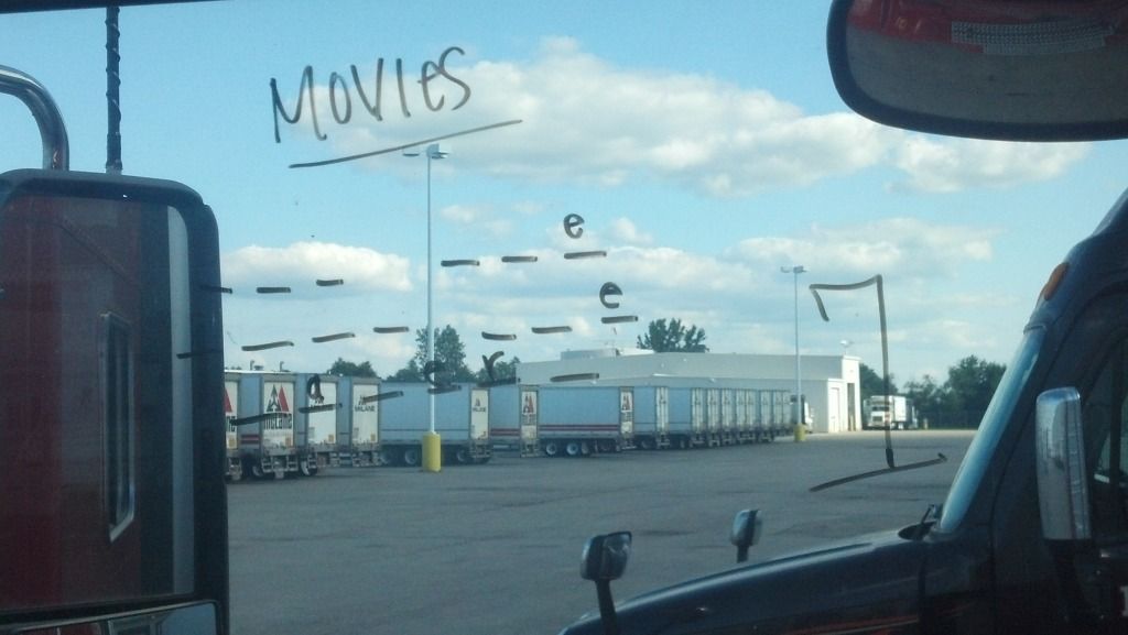truck drivers killing time playing hangman on windshield